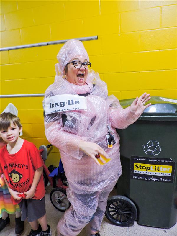 Students and teachers dressing up for a vocabulary parade. 